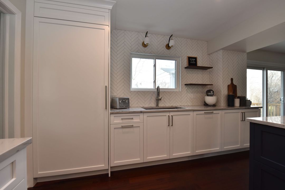Glenview kitchen paneled Sub Zero wood floating shelves by Kelly Thayer