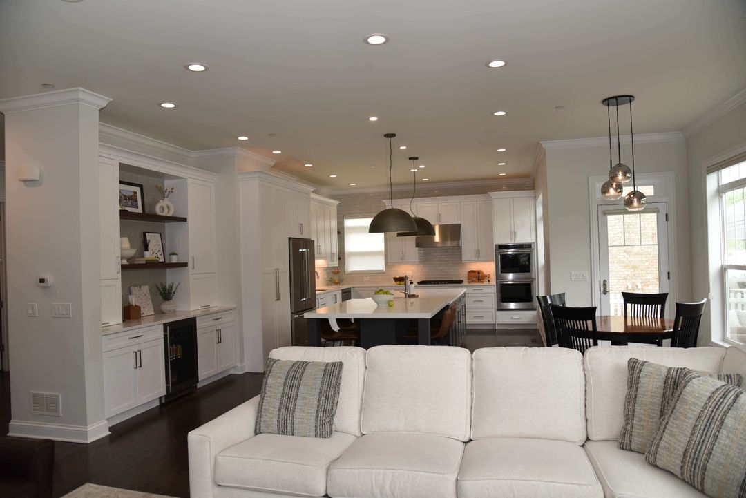 Open concept kitchen created by removing dining room wall - Northbrook remodel by Kelly Thayer