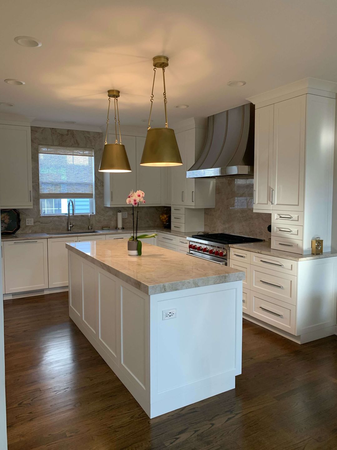 Glenview custom kitchen quartzite backsplash brass pendants by kelly thayer