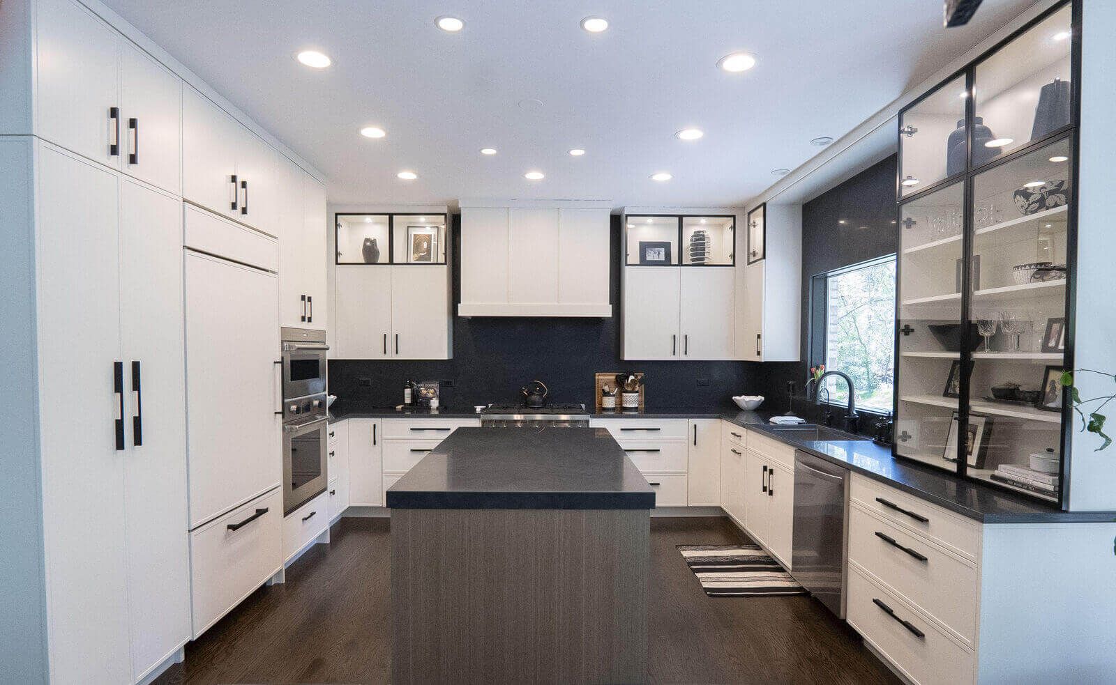 Northbrook Kitchen Remodel | Kelly Thayer Design Kildeer kitchen remodel with white skinny shaker cabinets, black quartzite countertops, and rift-cut oak island — Kelly Thayer Design